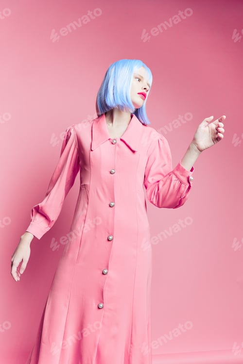 Preview: glamorous woman wears a blue wig makeup isolated background