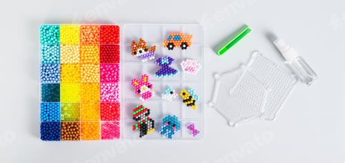 Preview: A box with aqua beads and tools for creating a decor top view web banner