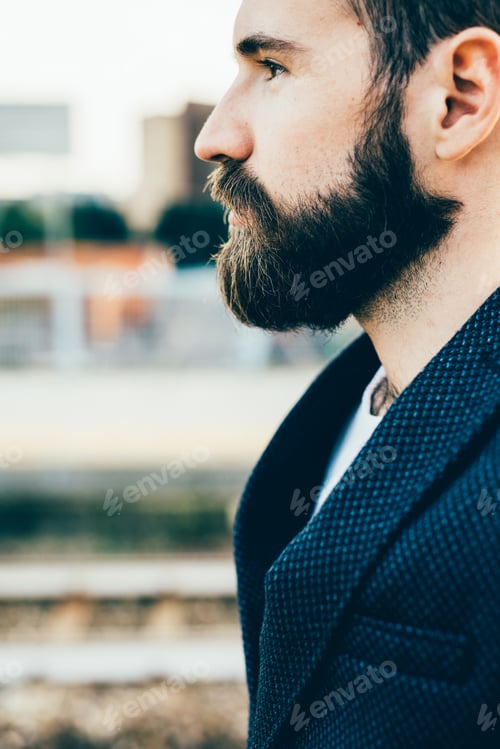 Preview: Young bearded man outdoor