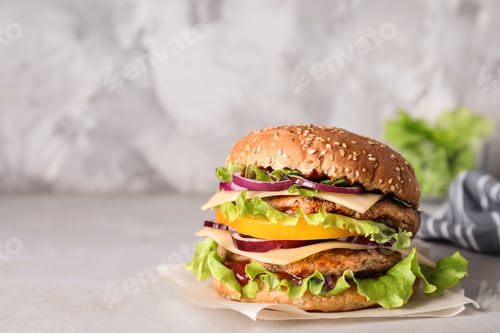 Preview: Delicious hamburger on table. Space for text