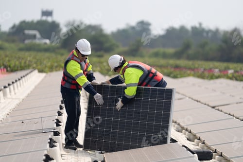 Preview: Renewable Energy Eco Technology Electric Power. Floating solar panels on lake.