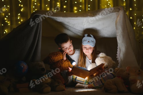 Preview: Children Reading in Blanket Fort with Stuffed Animals