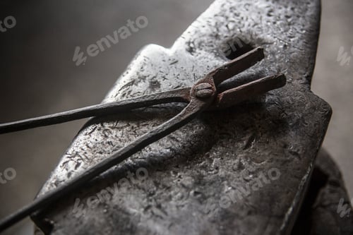 Preview: Closeup of blacksmith tools on an anvil