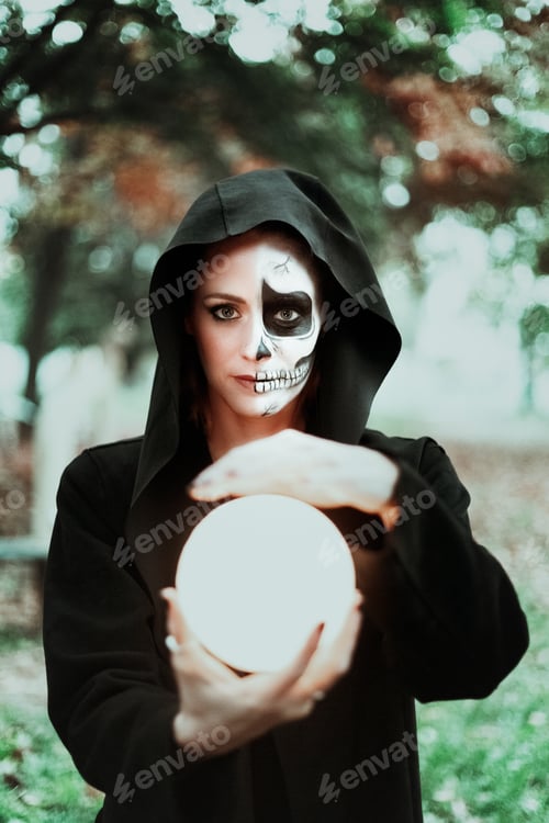 Preview: Portrait of girl during halloween holding a moon
