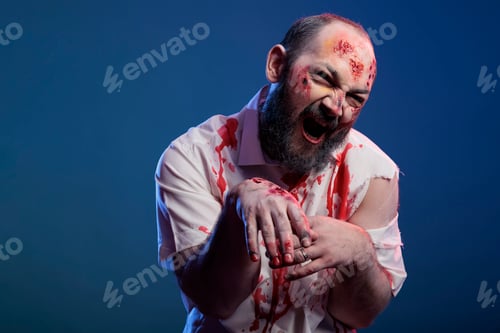Preview: Dangerous looking halloween zombie attacking