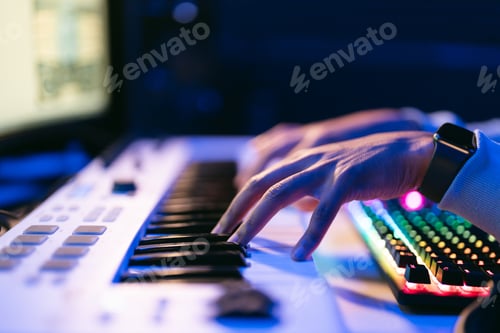 Preview: Man working in a modern technological sound and visual studio