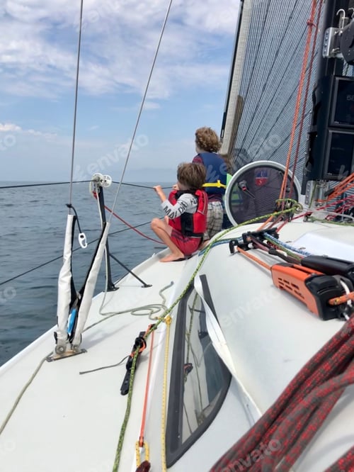 Preview: Kids on bow of sailboat