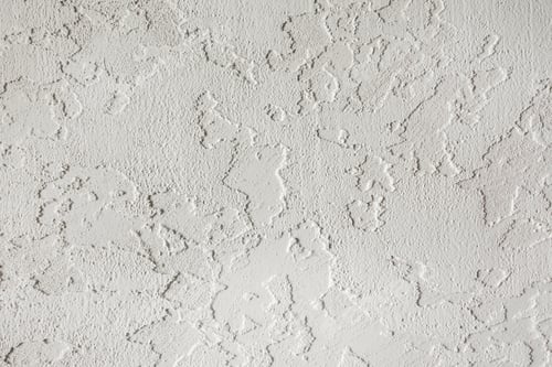 Preview: Photo of old gray cement wall with fractures.