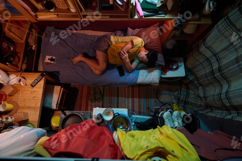 Preview: Napping on single bed in small apartment