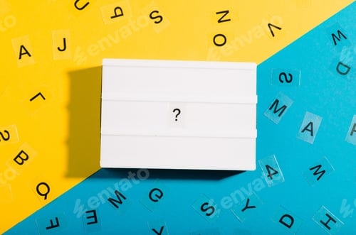 Preview: Question mark on light box, flat lay with duo color blue and yellow background, question to answer