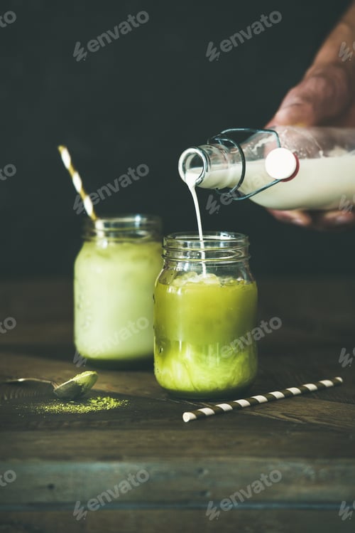 Preview: Cold refreshing summer iced coconut matcha latte drink