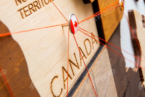 Preview: Canada flag on the pushpin and red threads on the wooden map