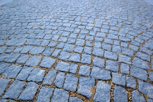 Preview: Gray cobbled road as background