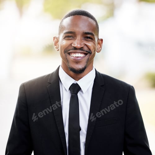 Smiling Man in Suit Jacket with Tie Outdoors