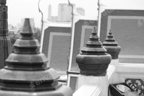 Preview: Pagoda at the end of the brown fence.