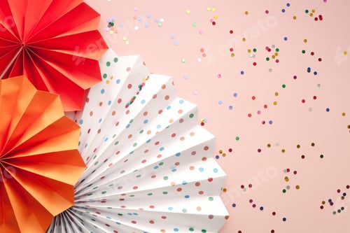 Preview: Party festive background. Colorful paper fans over pink background.