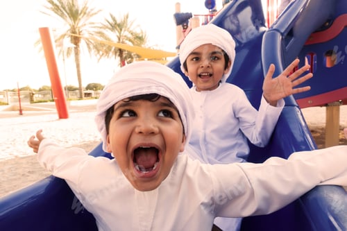 Preview: Arabic kids playing at the park in Dubai