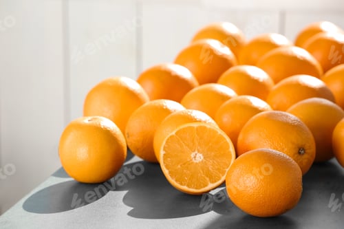 Preview: Fresh juicy oranges on table, space for text. Healthy fruits