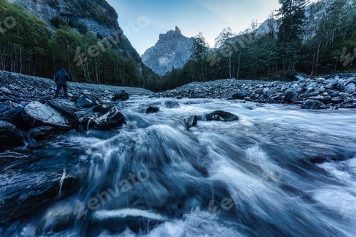 Preview: French Alps landscape of Cirque du Fer a Cheval with river flowing in the valley