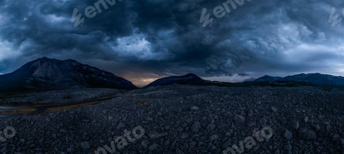 Preview: Dramatic Stormy Sky Over Rocky Mountain Landscape at Dusk in Alberta, Canada
