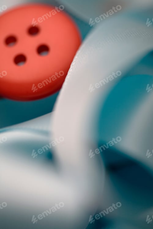 Preview: Red button with blue ribbon