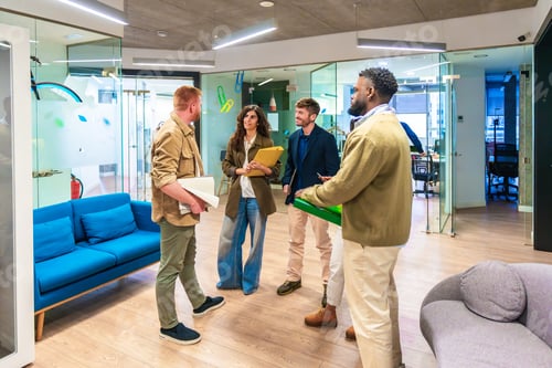 Preview: Startup businesspeople discussing new project in modern office