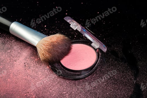 Preview: Close up of a make up brush and round cosmetic powder box.