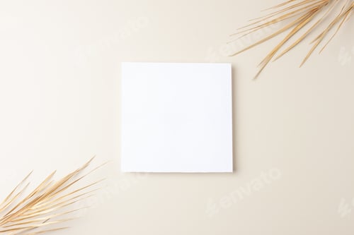 Preview: Minimal composition with palm leaf on pastel beige background. Flat lay, copy space