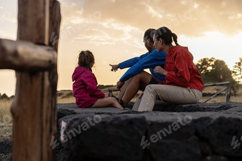 Preview: Family Watching Sunset in Nature