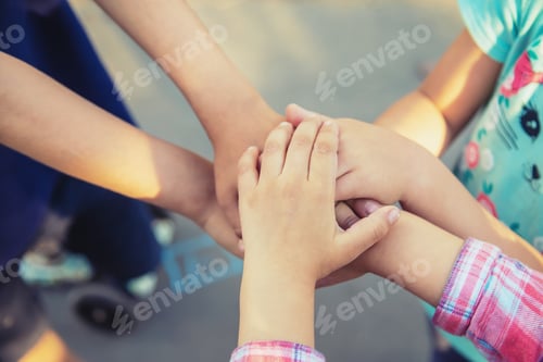 Preview: hands of children, many friends, games. Selective focus