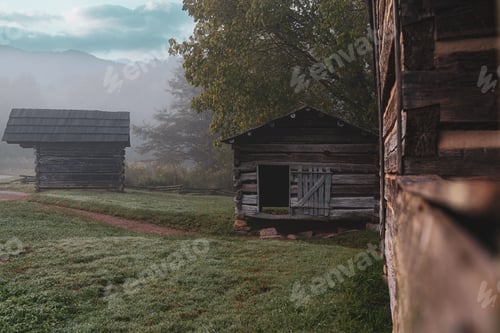 Preview: Traditional countryside, wooden houses in village, and sheeps grazing nearby