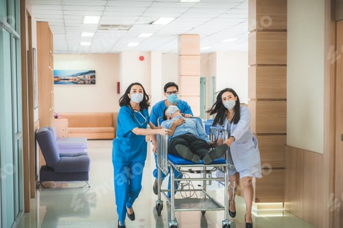 Preview: Emergency Department: Doctors, Nurses and Paramedics Run and Push Gurney