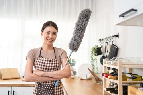 Preview: Portrait of Asian young cleaning service woman worker working in house.