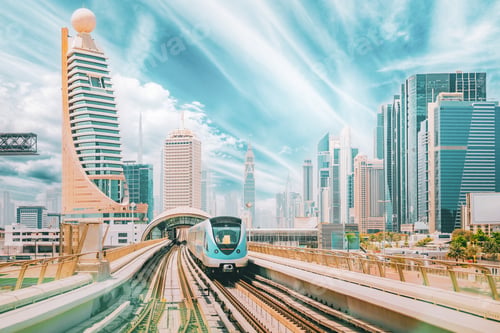 Preview: Metro road among glass skyscrapers in Dubai. Metropolitan railway among modern glass skyscrapers in