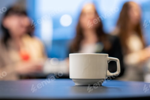 Preview: close-up of a cup of coffee on a table during a lunch break at a conference