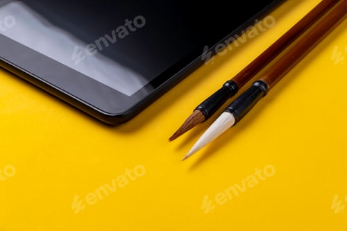 Preview: Tablet with two Chinese paintbrushes Mao Pi.