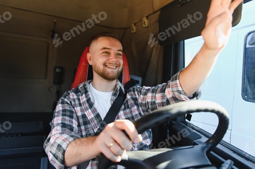 Preview: Young man truck driver waving from cab