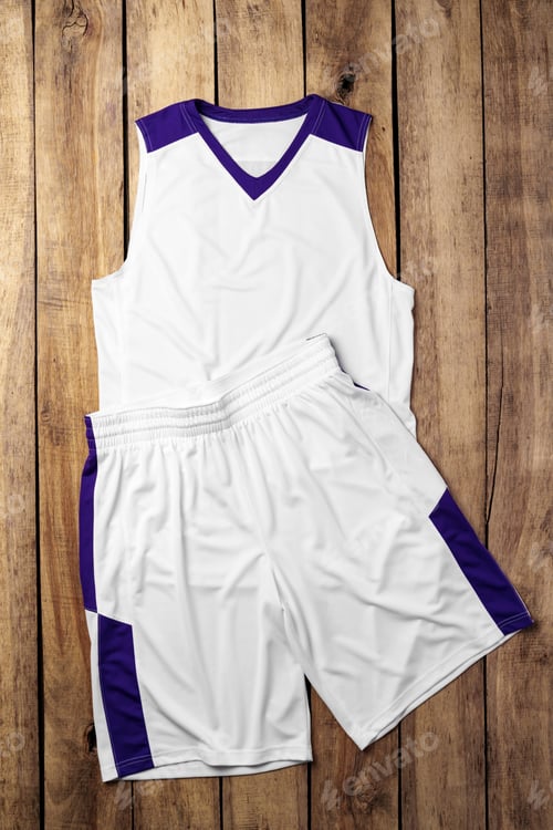 Preview: Basketball uniform on wooden background top view