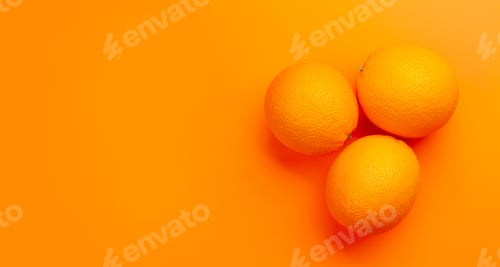 Preview: Fresh ripe orange fruit on orange background