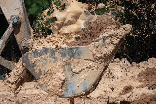 Preview: bulldozer machine digging the ground and removing sand for excavation purpose