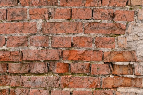 Preview: An old crumbling brick wall. textured background