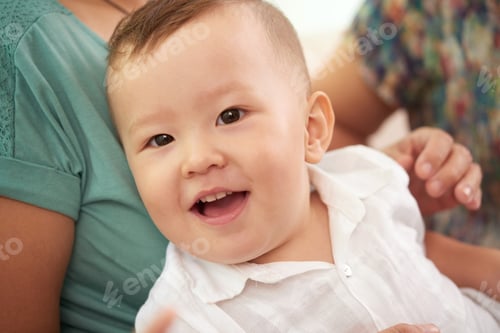 Preview: Happy mixed-race baby