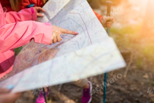 Preview: trekking woman hand pointing route on map