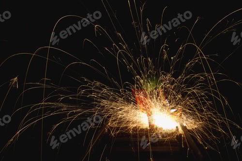 Preview: Anonymous man working with steel