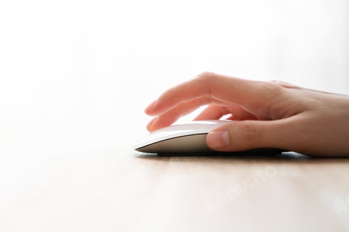 Preview: Close up of hand using on white mouse and clicking on office table.