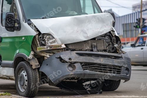 Preview: Heavily damaged car after car crash accident on a city street.