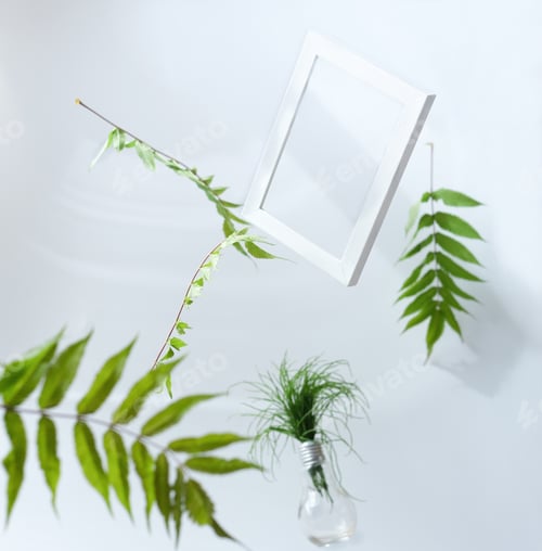 Preview: Beautiful flying green leaves background with white frame.