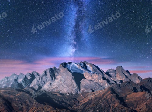 Preview: Milky Way over mountains at starry night in autumn