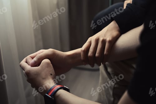 Preview: Close up view woman touching her husband hand, comforting, encouraging and understanding.