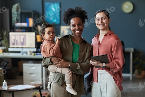 Preview: Portrait of Multigenerational Family in Modern Office Environment